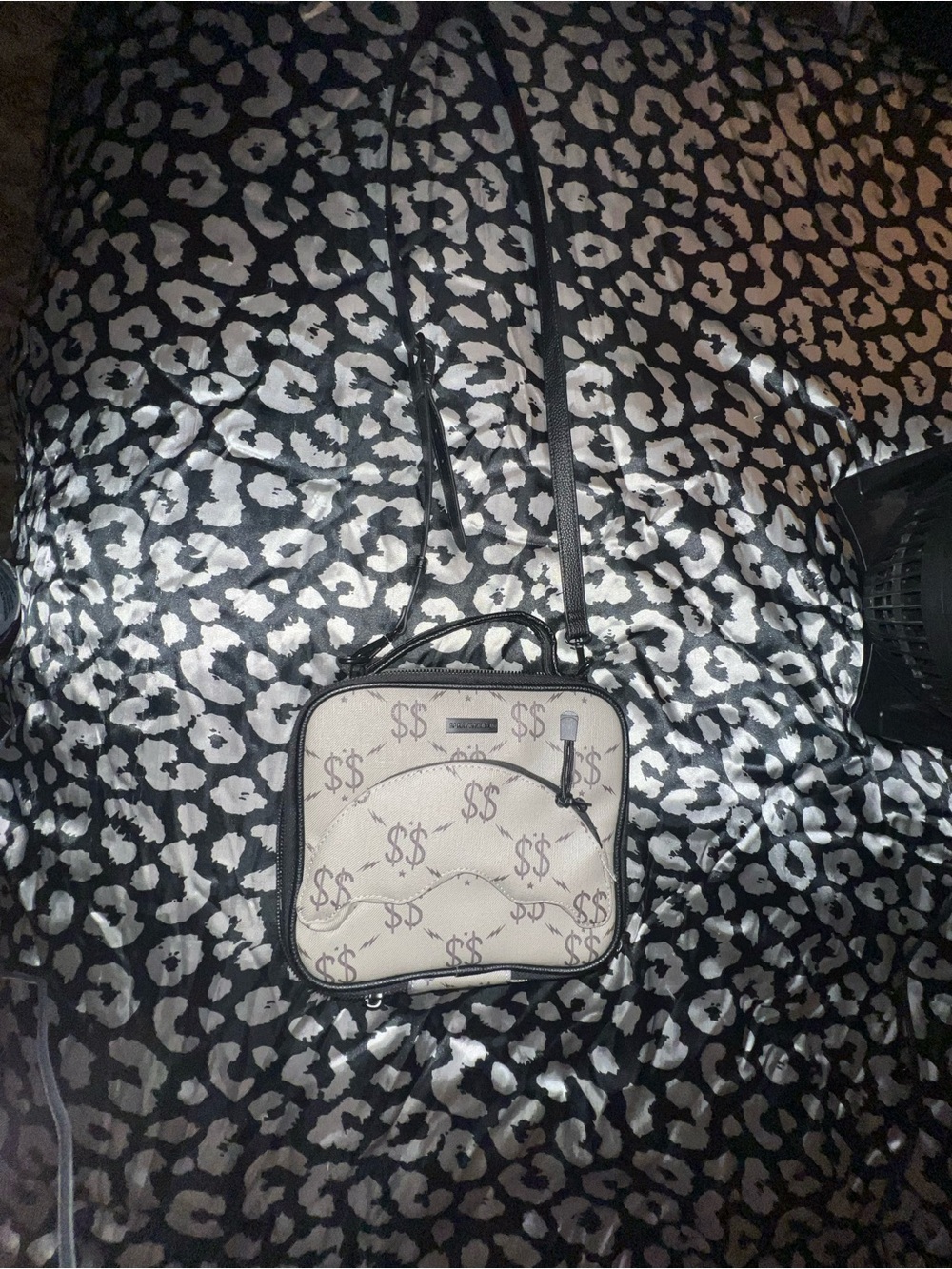 Sprayground White Crossbody Bag with Black Trim and Dollar Sign Print